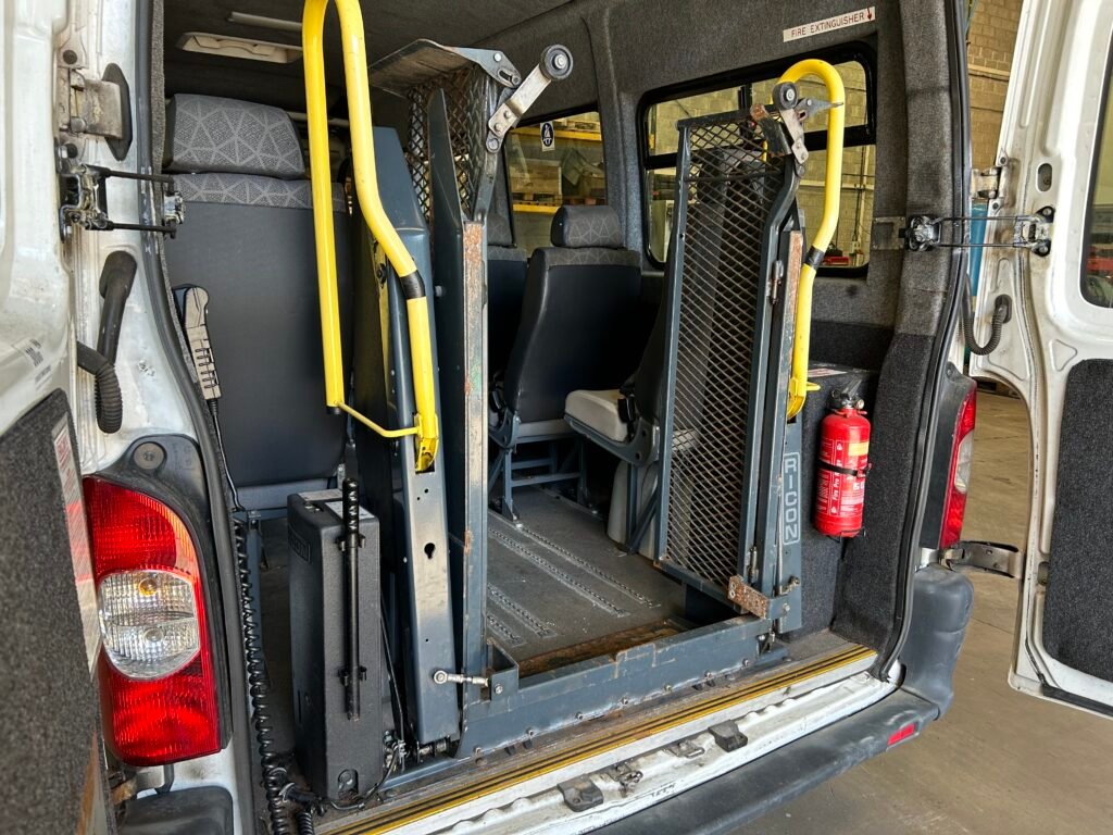 Electric wheelchair lift for van or minibus