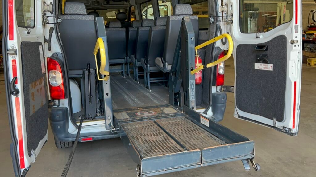 Electric wheelchair lift for van or minibus