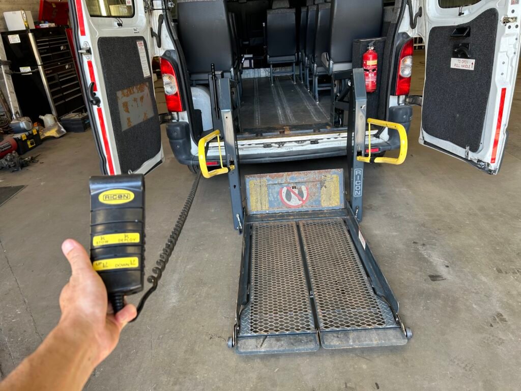 Electric wheelchair lift for van or minibus