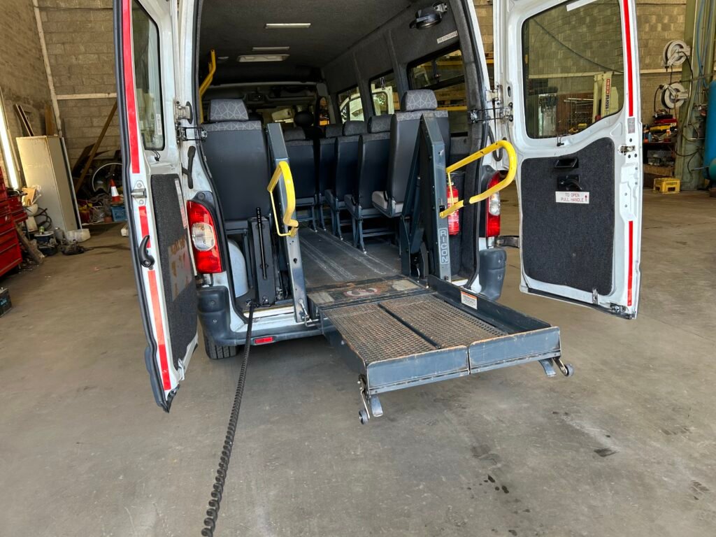 Electric wheelchair lift for van or minibus