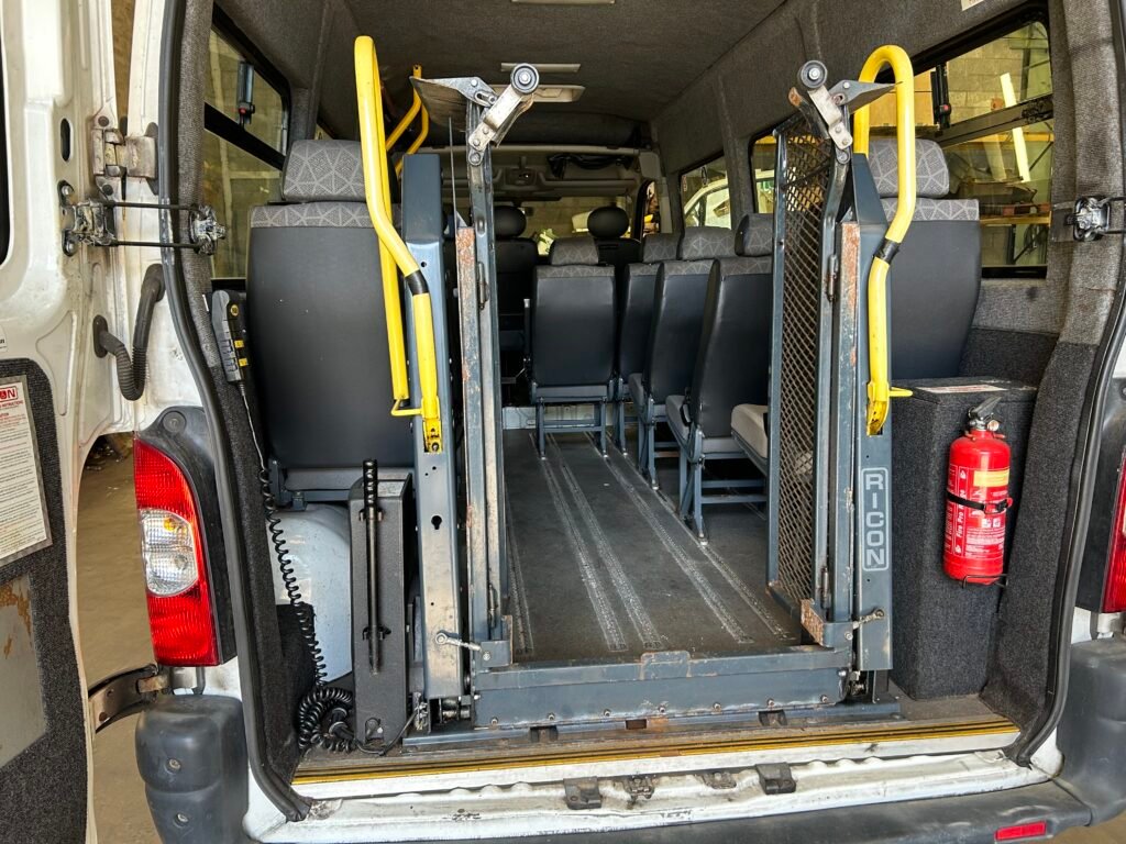 Electric wheelchair lift for van or minibus